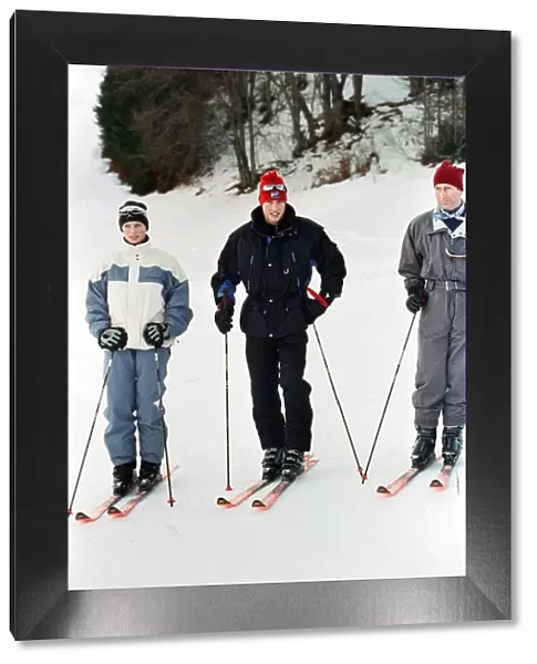 Zara Phillips, Prince William and Prince Charles pose on the ski slopes of Klosters