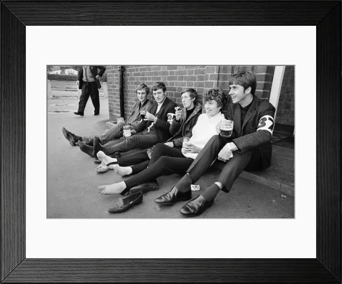 Framed Print : Charity Walk Completed, these young participants enjoy a rest and pint of beer Framed Print : Charity Walk Completed, these young participants enjoy a rest and pint of beer