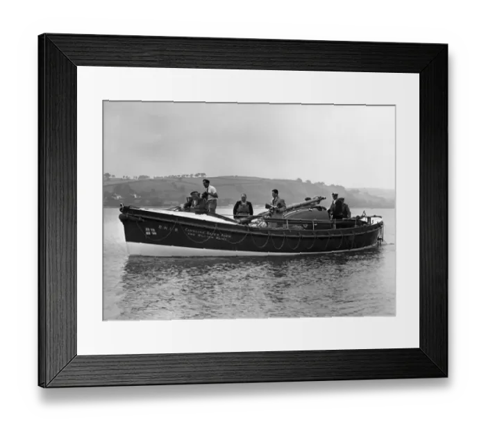 Framed Print : Ferryside lifeboat Caroline Oates Aver and William Maine plunges away from her launching