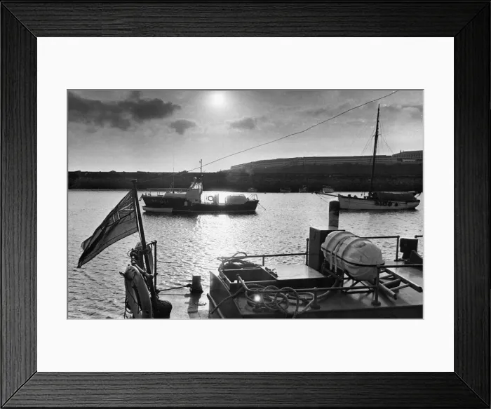 Framed Print : The sea is pool-placid as the sun goes down and the Barry lifeboat stands at her harbour Framed Print : The sea is pool-placid as the sun goes down and the Barry lifeboat stands at her harbour