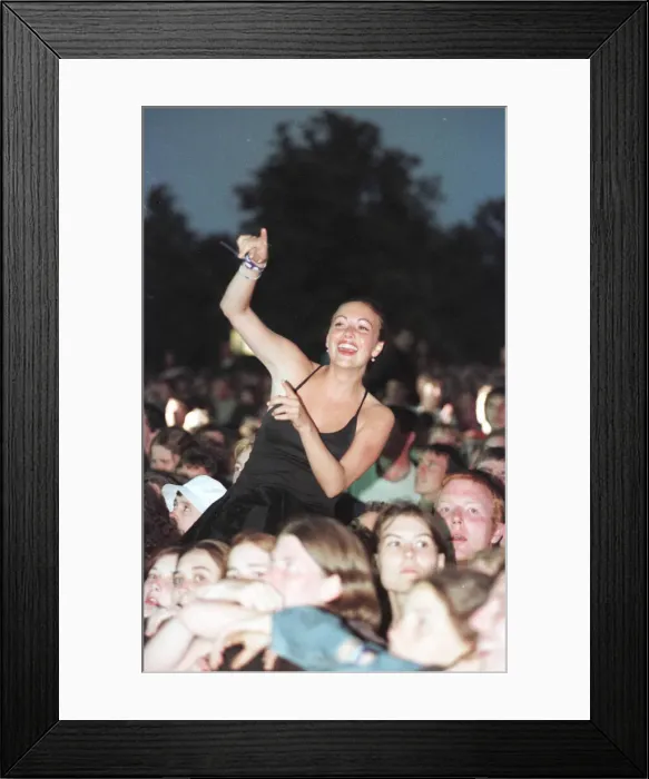 Framed Print : Oasis Fans enjoy themselves at their concert at Knebworth