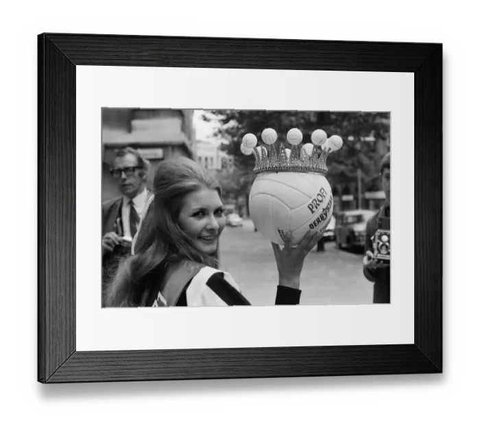 Framed Print : Eleven girls this morning lined-up dressed in the colours of their favourite football