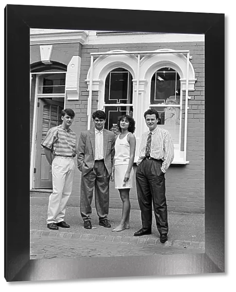 Four people outside a fashion shop in Middlesbrough. Circa 1984