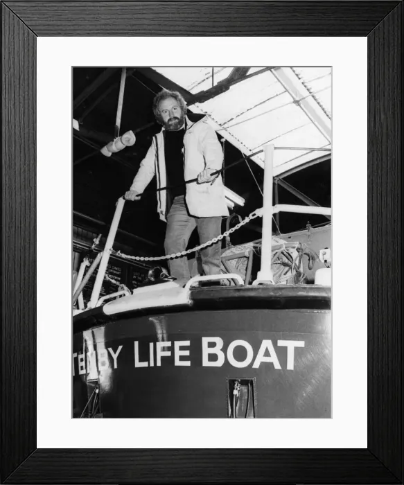 Framed Print : Tenby lifeboat coxswain Alan Thomas at the Tenby lifeboat station before being presented Framed Print : Tenby lifeboat coxswain Alan Thomas at the Tenby lifeboat station before being presented
