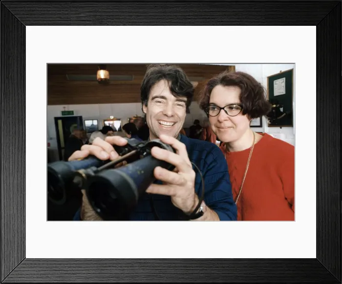 Framed Print : Steve Moon from the Porthcawl Welcome Group poses with and Veronigue Foucher-Morvan
