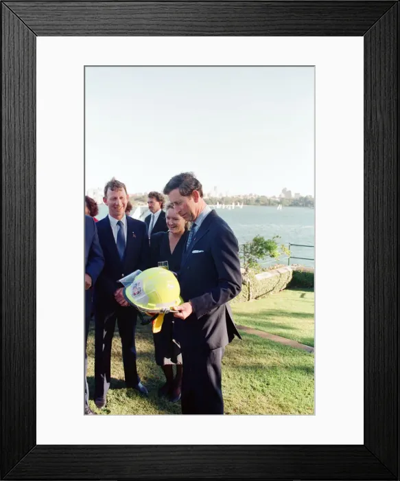 Framed Print : Prince Charles in Sydney, pictured holding a fire fighters helmet. Sydney, Australia Framed Print : Prince Charles in Sydney, pictured holding a fire fighters helmet. Sydney, Australia