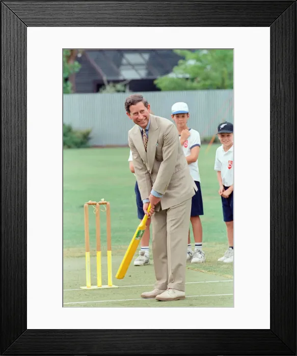 Framed Print : Prince Charles tries his hand at cricket during a visit to Fendalton Primary School Framed Print : Prince Charles tries his hand at cricket during a visit to Fendalton Primary School