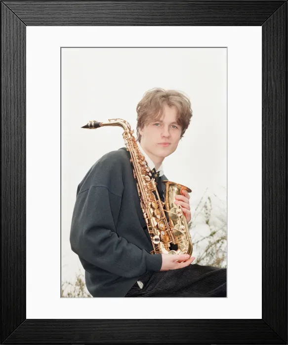 Framed Print : Felix Hughes, Saxophone Player from Ysgol Brynhyfryd School in Ruthin, Denbighshire