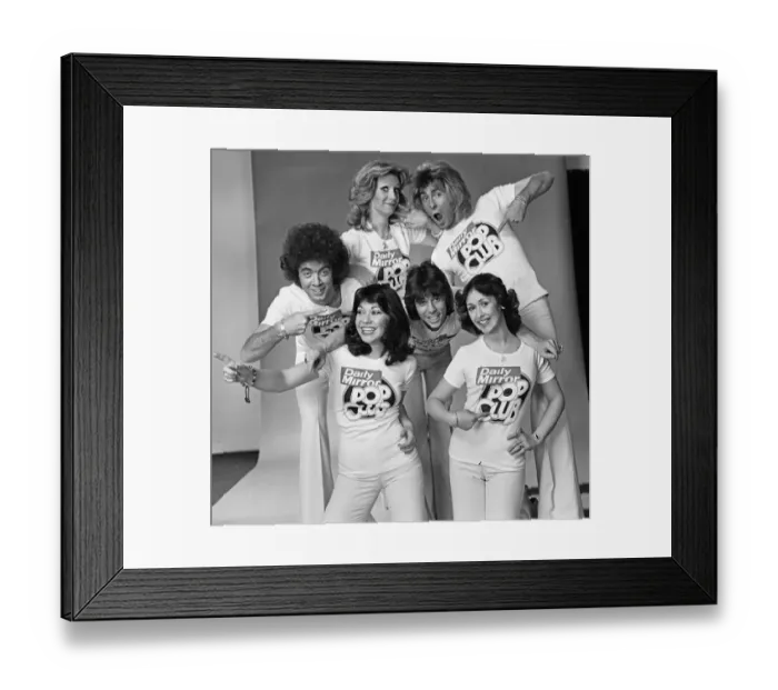 Framed Print : Guys N Dolls pop group wearing Daily Mirror Pop Club T-shirts 29th January 1976