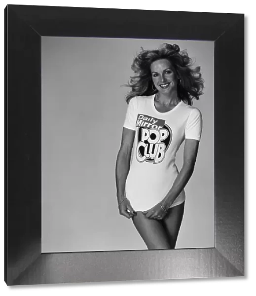 Model Lorna Carr wearing a Daily Mirror Pop Club T-shirt. 4th February 1976