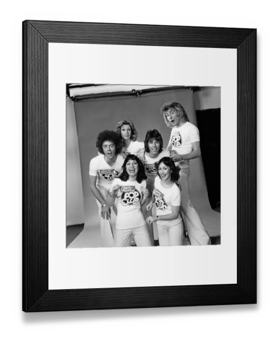 Framed Print : Guys N Dolls pop group wearing Daily Mirror Pop Club T-shirts 29th January 1976 Framed Print : Guys N Dolls pop group wearing Daily Mirror Pop Club T-shirts 29th January 1976