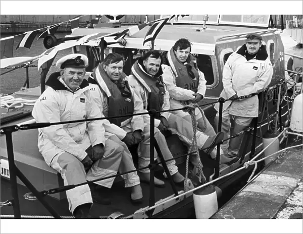 John McDermott, coxswain of the Hoylake lifeboat with crew members Richard Martindale