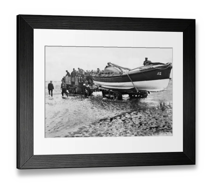 Framed Print : The crew of the RNLB Oldham wheel the lifeboat down the beach at Hoylake Lifeboat Station Framed Print : The crew of the RNLB Oldham wheel the lifeboat down the beach at Hoylake Lifeboat Station