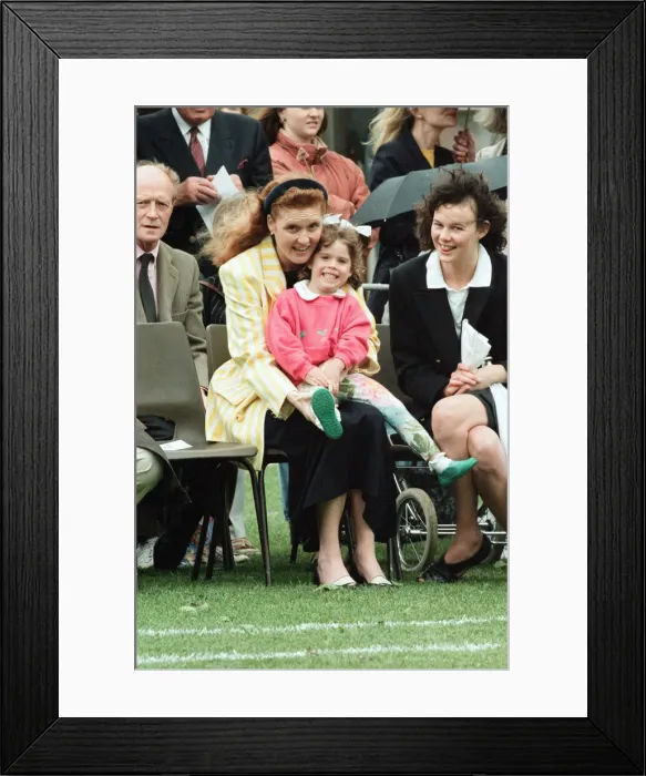 Framed Print : Sarah, Duchess of York and Princess Eugenie watching sports day at Upton House School