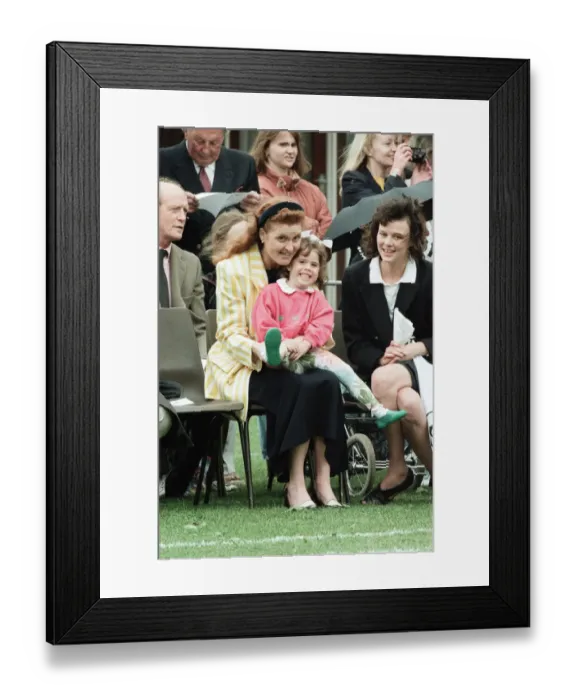 Framed Print : Sarah, Duchess of York and Princess Eugenie watching sports day at Upton House School Framed Print : Sarah, Duchess of York and Princess Eugenie watching sports day at Upton House School