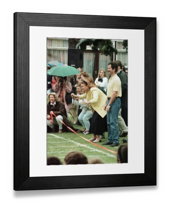 Framed Print : Sarah, Duchess of York watching Princess Beatrice during sports day at Upton House School