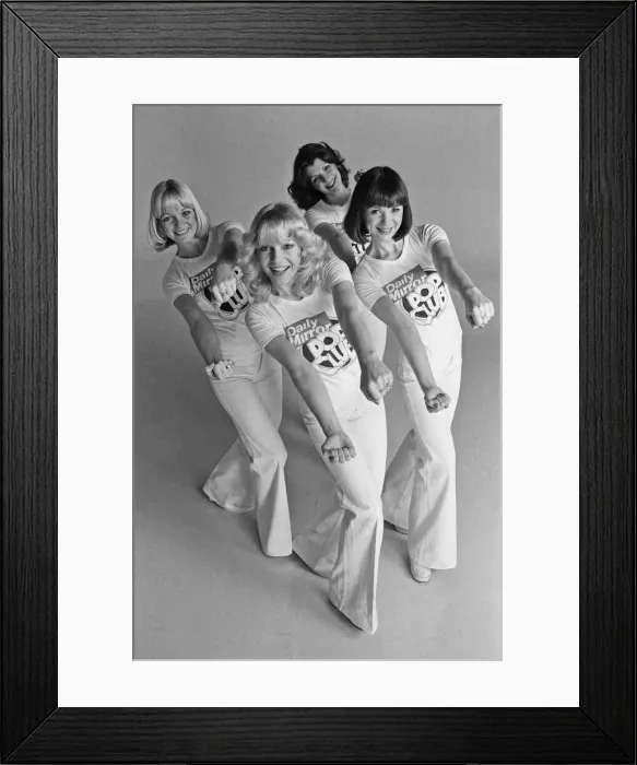 Framed Print : Models wearing Daily Mirror Pop Club T-shirts demonstrating the new Convoy disco dance Framed Print : Models wearing Daily Mirror Pop Club T-shirts demonstrating the new Convoy disco dance