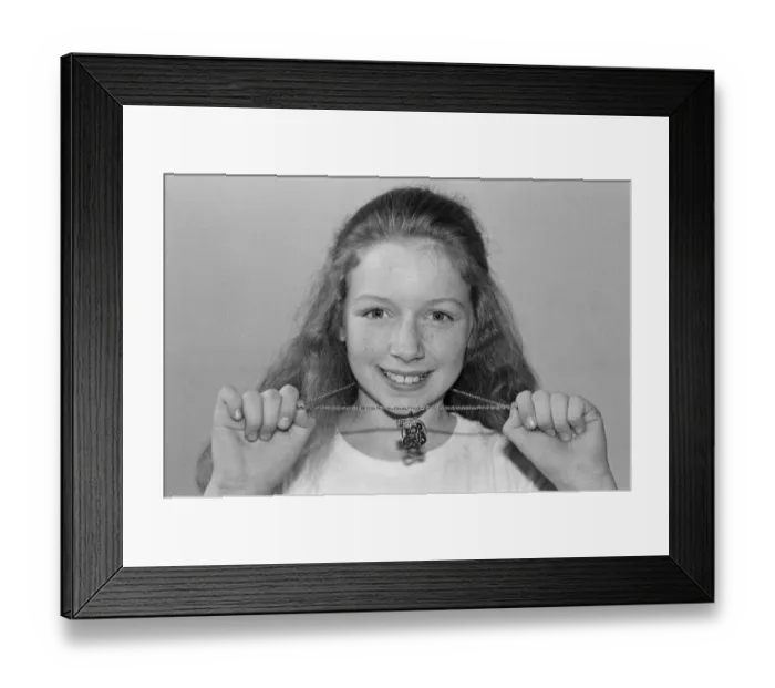 Framed Print : Lena Zavaroni wears a Daily Mirror Pop Club T-Shirt and a Daily Mirror Pop Club Pendant Framed Print : Lena Zavaroni wears a Daily Mirror Pop Club T-Shirt and a Daily Mirror Pop Club Pendant