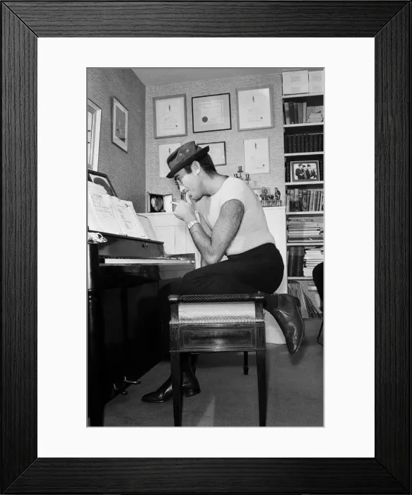 Framed Print : Songwriter and composer Lionel Bart in his flat in South Kensington Framed Print : Songwriter and composer Lionel Bart in his flat in South Kensington
