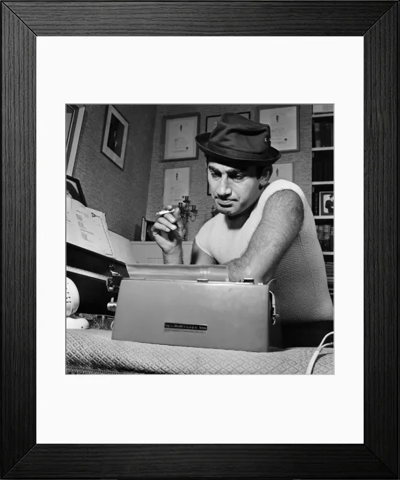 Framed Print : Songwriter and composer Lionel Bart in his flat in South Kensington Framed Print : Songwriter and composer Lionel Bart in his flat in South Kensington
