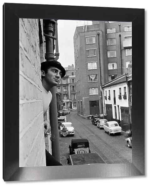 Songwriter and composer Lionel Bart at his flat in South Kensington