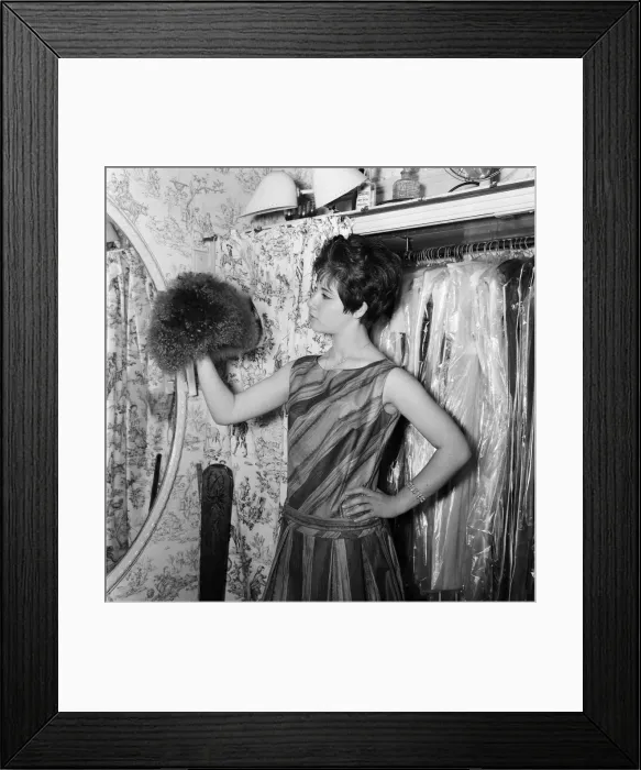 Framed Print : 14 year old singer Helen Shapiro, trying on clothes at Mary Fair'dress shop Framed Print : 14 year old singer Helen Shapiro, trying on clothes at Mary Fair'dress shop