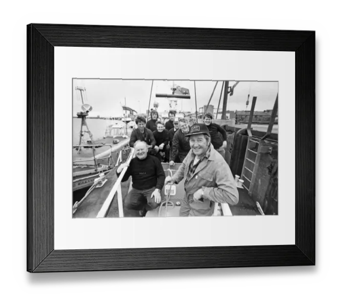 Framed Print : Coxswain John Connell with the crew of the new Amble lifeboat Margaret Graham