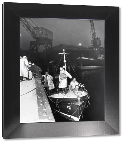 The Newbiggin lifeboat Richard Ashley tows the 40 ton hopper