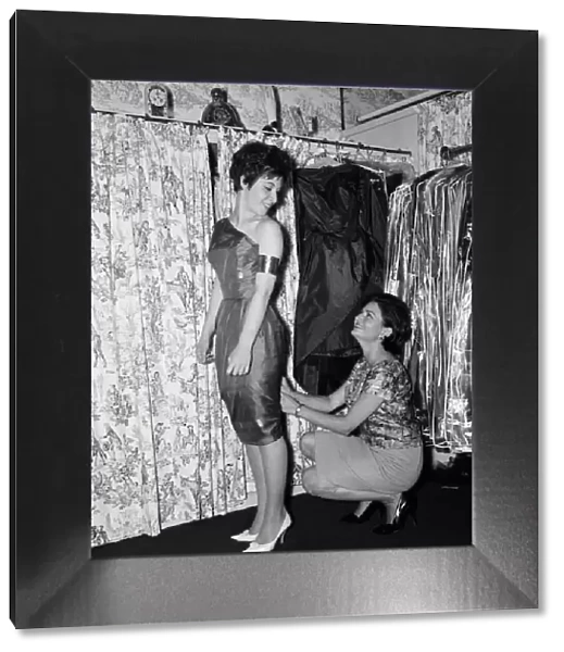 14 year old singer Helen Shapiro, trying on clothes at 'Mary Fair'dress shop