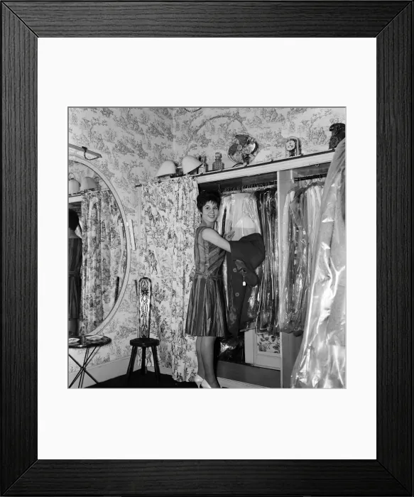 Framed Print : 14 year old singer Helen Shapiro, trying on clothes at Mary Fair'dress shop Framed Print : 14 year old singer Helen Shapiro, trying on clothes at Mary Fair'dress shop
