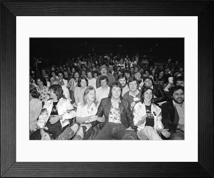 Framed Print : Paul and Linda McCartney and other members of the band Wings seen here at Madison Square