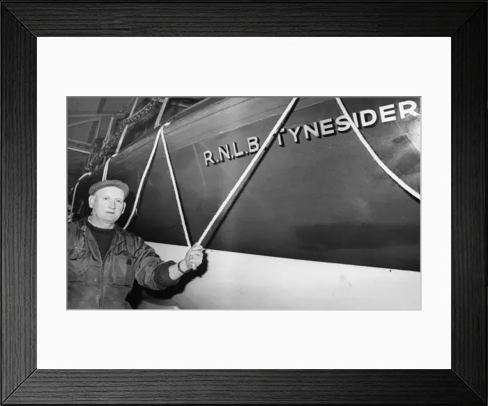 Framed Print : Mr. Jack Watson, a permanent RNLI mechanic, with the Tynesider lifeboat Framed Print : Mr. Jack Watson, a permanent RNLI mechanic, with the Tynesider lifeboat