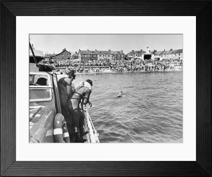Framed Print : A swimmer is hauled to safety near Morpeth, Tyne and Wear Framed Print : A swimmer is hauled to safety near Morpeth, Tyne and Wear