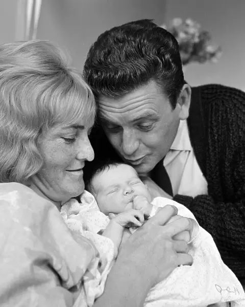Actress Sheila Hancock and actor Alec Ross with their newborn baby Melanie at Queen