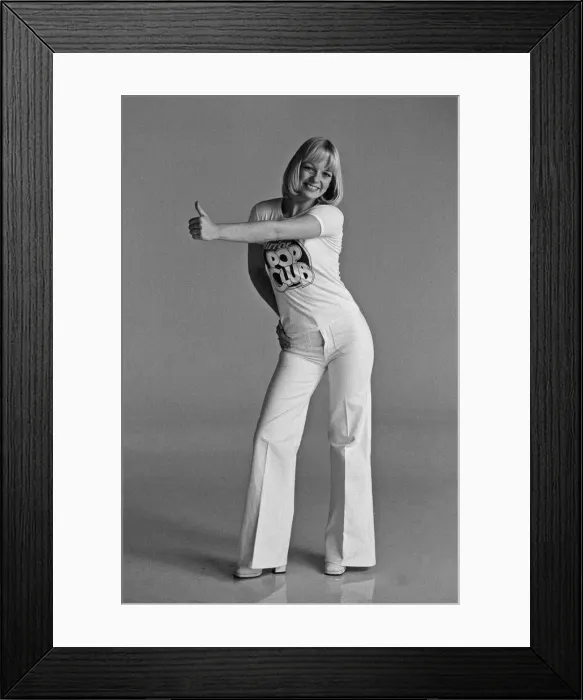 Framed Print : Models wearing Daily Mirror Pop Club T-shirts demonstrating the new Convoy disco dance