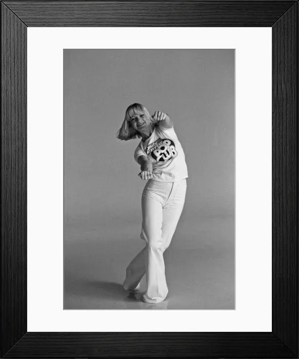 Framed Print : Models wearing Daily Mirror Pop Club T-shirts demonstrating the new Convoy disco dance