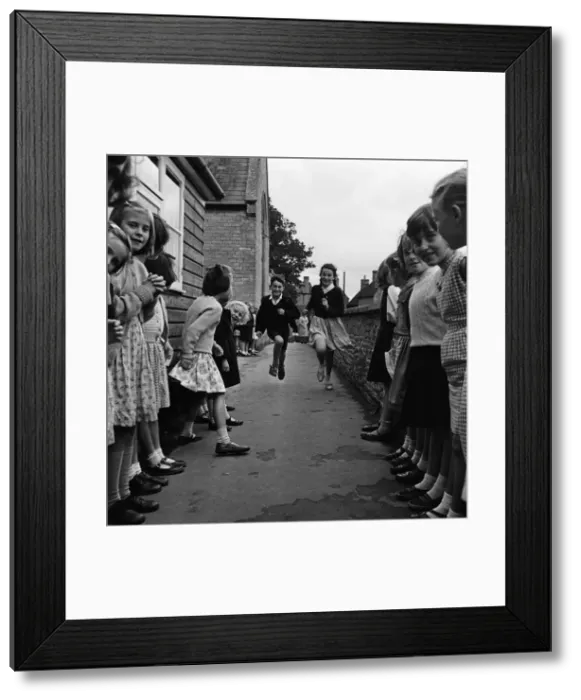 Framed Print : Tetbury primary school, Gloucestershire. Children playing outside. September 1962 Framed Print : Tetbury primary school, Gloucestershire. Children playing outside. September 1962