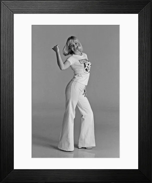 Framed Print : Models wearing Daily Mirror Pop Club T-shirts demonstrating the new Convoy disco dance Framed Print : Models wearing Daily Mirror Pop Club T-shirts demonstrating the new Convoy disco dance
