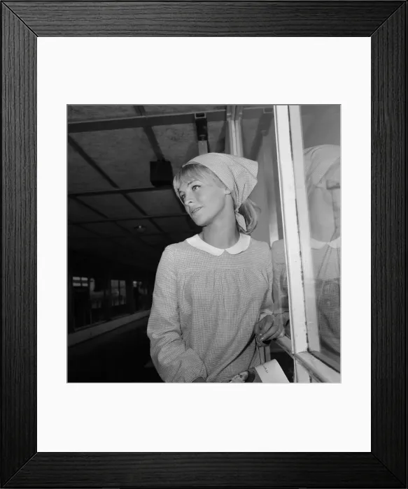 Framed Print : Pictured leaving London Airport for Rome is actress Julie Christie