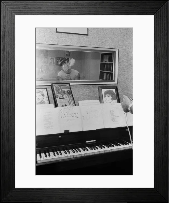 Framed Print : Songwriter and composer Lionel Bart in his flat in South Kensington Framed Print : Songwriter and composer Lionel Bart in his flat in South Kensington