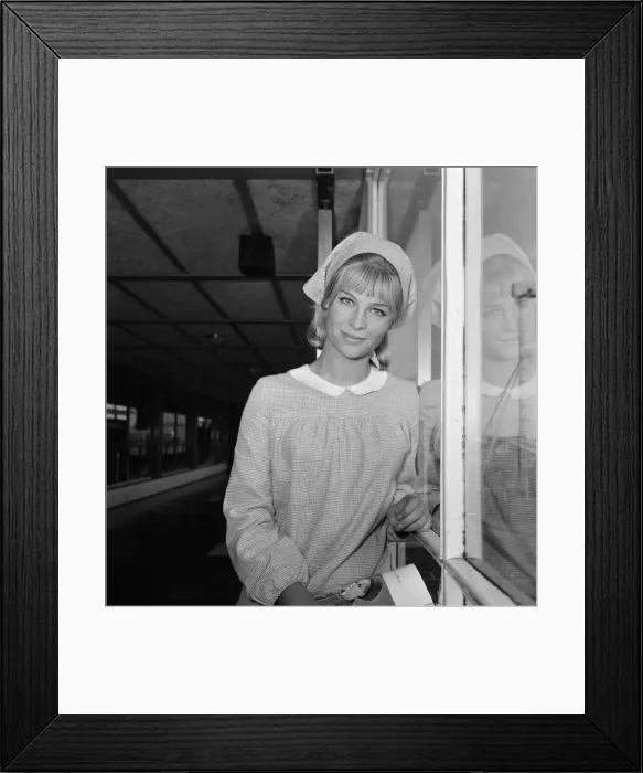 Framed Print : Pictured leaving London Airport for Rome is actress Julie Christie