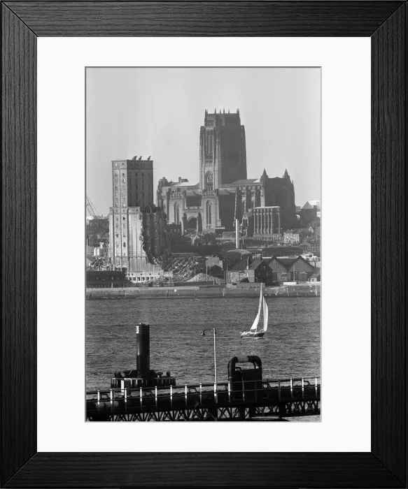 Framed Print : Views of Liverpool Anglican Cathedral and the Grain Silo, currently being demolished Framed Print : Views of Liverpool Anglican Cathedral and the Grain Silo, currently being demolished