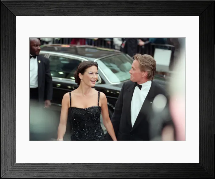 Framed Print : Catherine Zeta-Jones and Michael Douglas at the film premiere of Entrapment Framed Print : Catherine Zeta-Jones and Michael Douglas at the film premiere of Entrapment