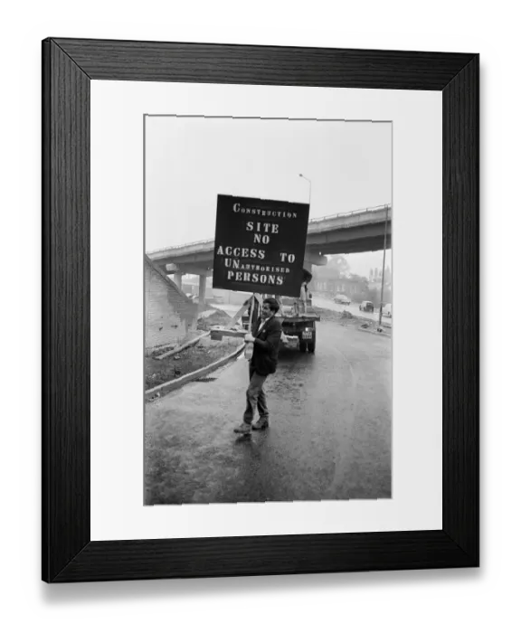 Framed Print : Signs and barriers are being placed at access points on the Gravelly Hill interchange to Framed Print : Signs and barriers are being placed at access points on the Gravelly Hill interchange to