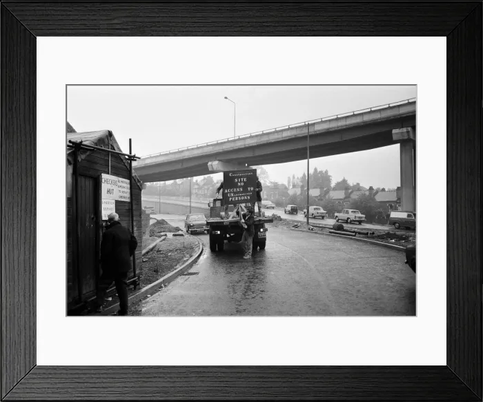Framed Print : Signs and barriers are being placed at access points on the Gravelly Hill interchange to Framed Print : Signs and barriers are being placed at access points on the Gravelly Hill interchange to
