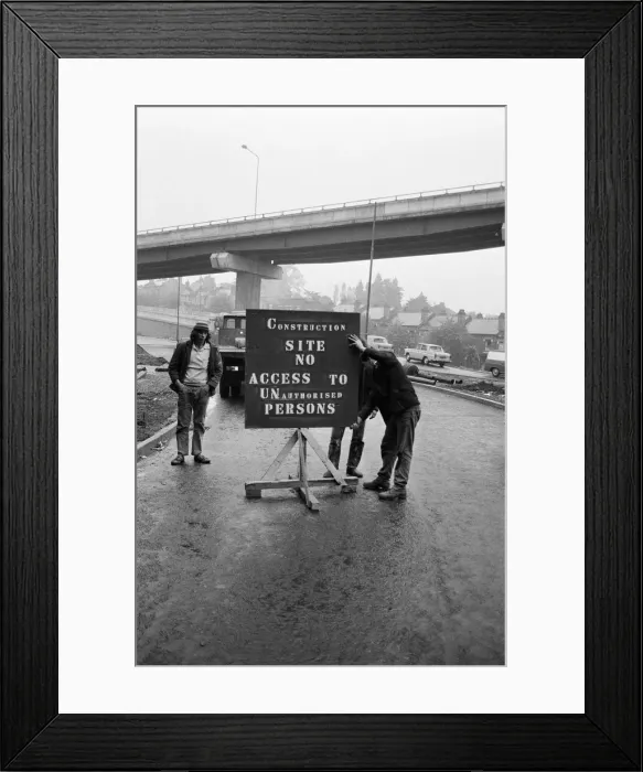 Framed Print : Signs and barriers are being placed at access points on the Gravelly Hill interchange to Framed Print : Signs and barriers are being placed at access points on the Gravelly Hill interchange to
