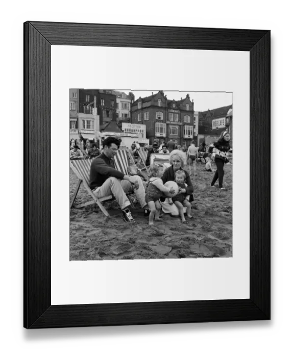 Framed Print : A family enjoying a holiday on the beach at Scarborough, North Yorkshire. May 1964 Framed Print : A family enjoying a holiday on the beach at Scarborough, North Yorkshire. May 1964