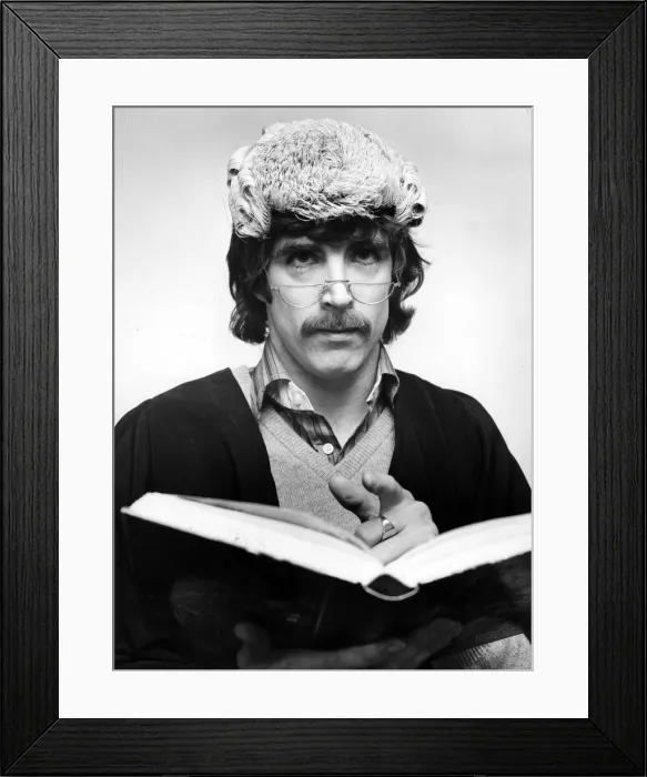 Framed Print : Manchester Citys left back Paul Power, wearing a wig and gown. 7th November 1979 Framed Print : Manchester Citys left back Paul Power, wearing a wig and gown. 7th November 1979