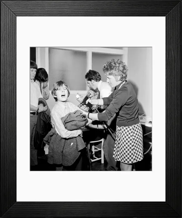 Framed Print : Flu vaccinations, November 1971. Pupils at Winchester College, Hampshire Framed Print : Flu vaccinations, November 1971. Pupils at Winchester College, Hampshire