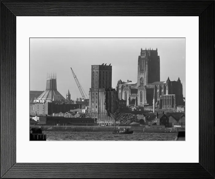 Framed Print : Views of Liverpool Anglican Cathedral and the Grain Silo, currently being demolished Framed Print : Views of Liverpool Anglican Cathedral and the Grain Silo, currently being demolished